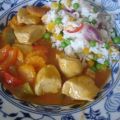 Hähnchenbrustfilet-Curry mit buntem Reis