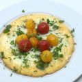 Französisches Omelett mit geschmolzenen Tomaten