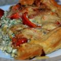 Tomaten-Rucola-Tarte mit Meeresfrüchten