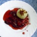 Pflaumenknödel auf Pflaumenröster