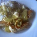 Hähnchenstreifen mit Reis und Currysoße