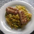 Paella mit Gemüse und Salchichas