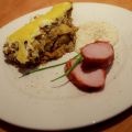 Schweinelachs mit Parmaschinken und Linsengratin