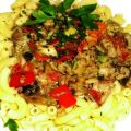 Pikante Fisch-Gemüsepfanne auf Pasta