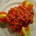 Kotelett mit Paprika-Zwiebel-Haube